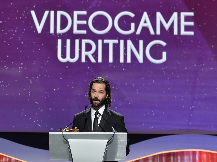 CENTURY CITY, CA - FEBRUARY 14: Writer Neil Druckmann accepts the award for Outstanding Achievement In Videogame Writing at the 2015 Writers Guild Awards L.A. Ceremony at the Hyatt Regency Century Plaza on February 14, 2015 in Century City, California. (Photo by Alberto E. Rodriguez/Getty Images for WGAw)